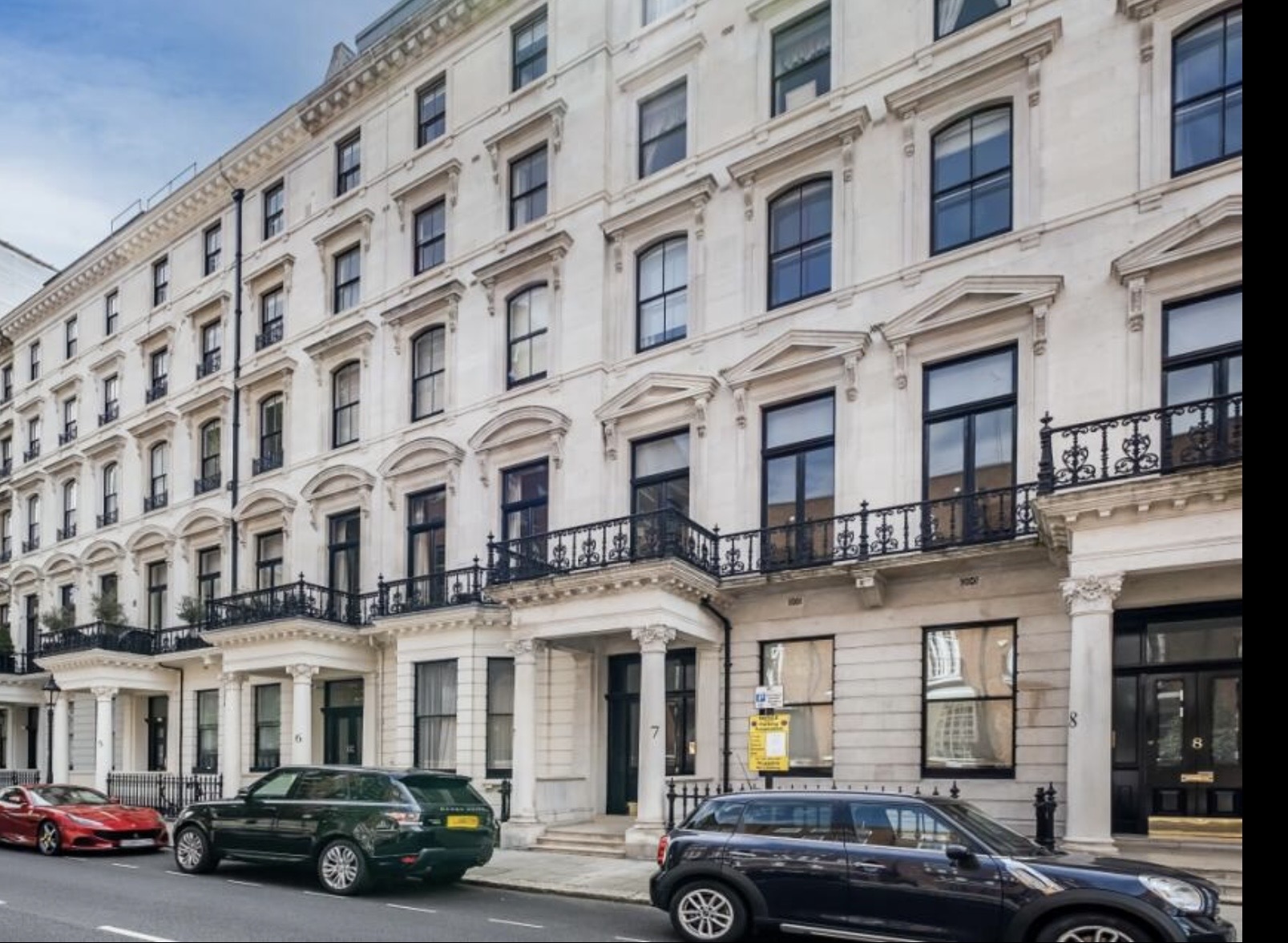 White stucco terrace of grand period buildings on Lancaster Gate, London